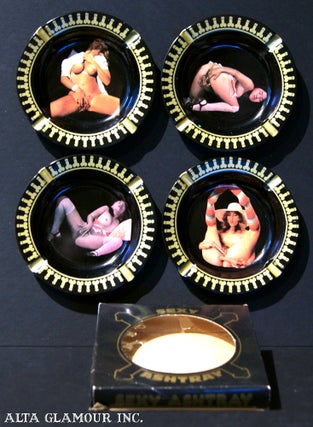Item #103588 A GROUP OF FOUR SEXY ASHTRAYS
