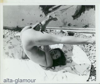 Item #52814 ORIGINAL PHOTOGRAPH -- IRENE BEST DOES SHOULDER STAND AND INSERTS ZUCCHINI