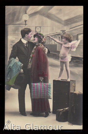 Item #77920 REAL PHOTO POSTCARD OF A COUPLE WITH CUPID