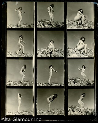 Item #91921 NUDE IN SEAMED STOCKINGS AND HEELS ON ROCKS -- PROOF SHEET